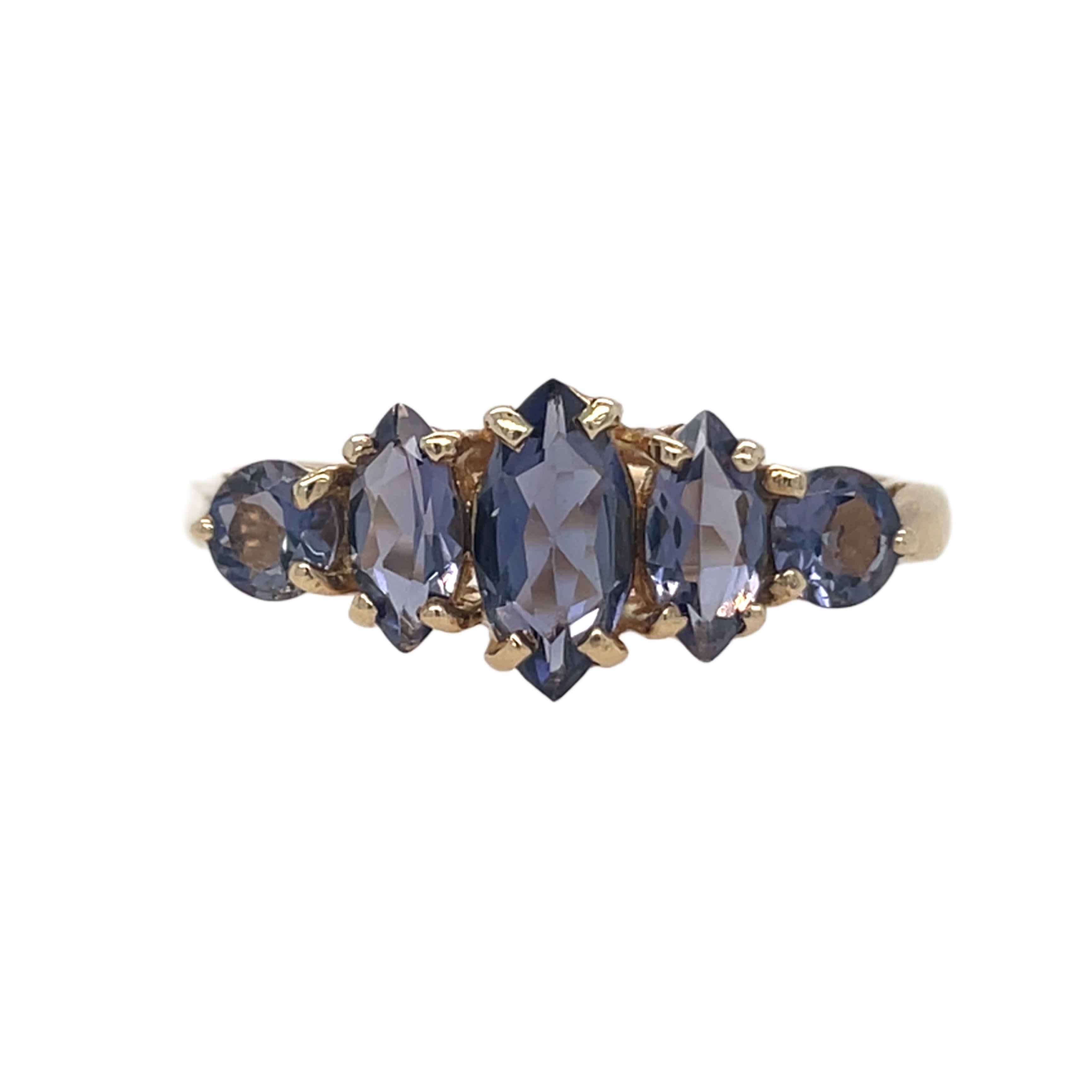 Iolite five-stone ring in yellow gold