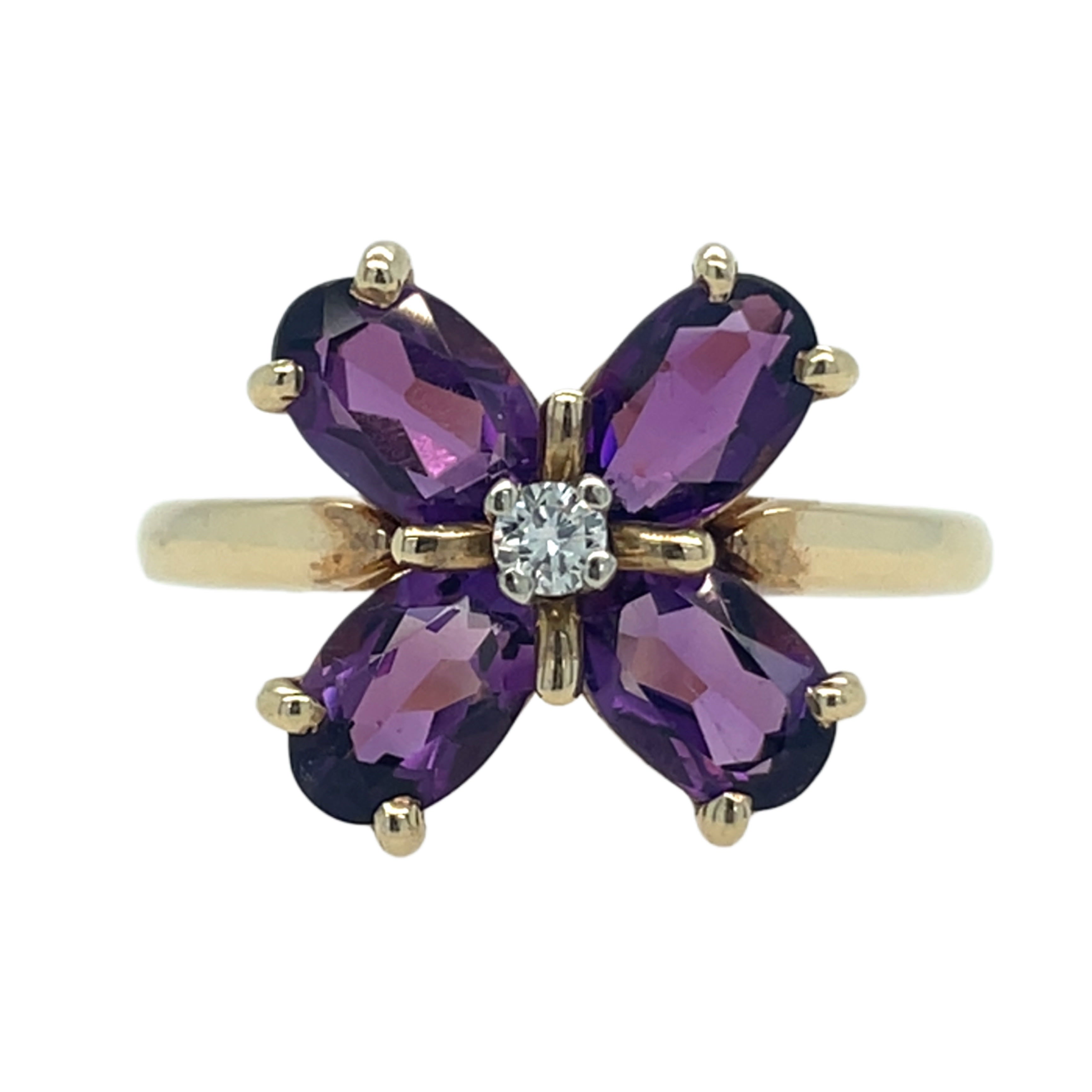 Amethyst flower ring with diamond center